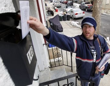 In the most recent Gallup polling, 74 percent of Americans rated the U.S. Postal Service as excellent. Overall, those polled approve of federal agencies, but not the U.S. government.  (Matt Rourke/AP, file)