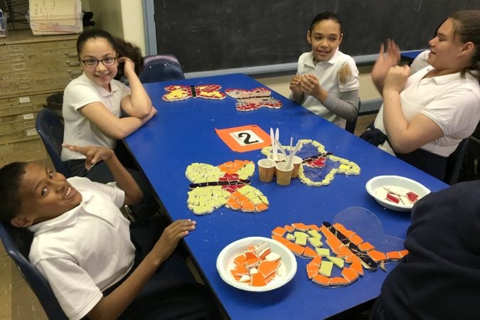 McClure students create mosaic butterflies for the 
