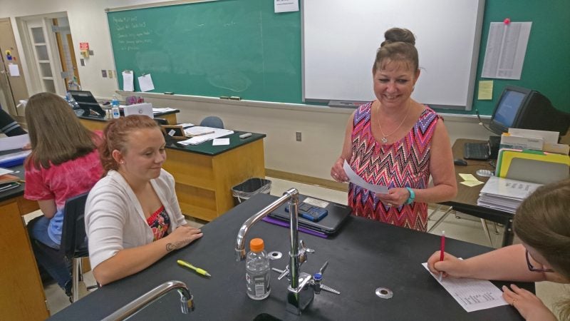 Corry High School chemistry teacher Roxann Dougherty quizzes students (Kevin McCorry/Keystone Crossroads)