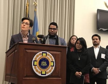 Caleb Arnold (left) is Philadelphia District Attorney Larry Krasner's pick to fill the newly created position of immigrant rights coordinator.