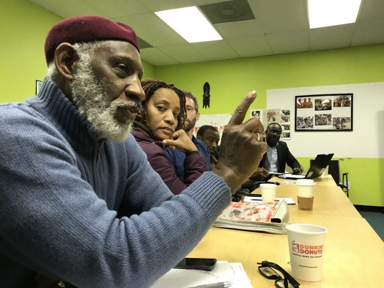 Stanley Straughter, a member of the Mayor's Commission on African and Caribbean Immigrant Affairs, speaks during a strategizing meeting of African and Caribbean community members on January 13, 2018 at Southwest Community Development Corporation in Philadelphia. (Laura Benshoff/WHYY)