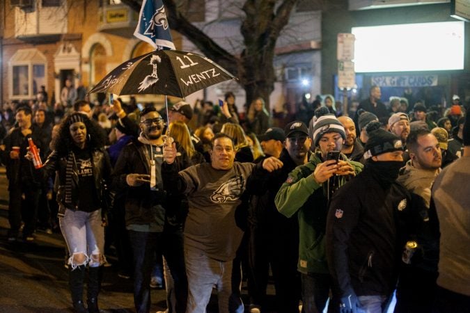 Eagles Fans celebrate on South Broad Street after their win over the Minnesota Vikings in the NFC Championship Game Sunday. (Brad Larrison for WHYY)