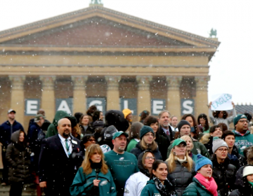 PMA staff gathers to sing the Eagles Fight Song ahead of the Super Bowl. (Kimberly Paynter/WHYY)