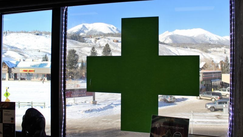 The green cross means this is a marijuana dispensary. (Bill Barlow/for WHYY)