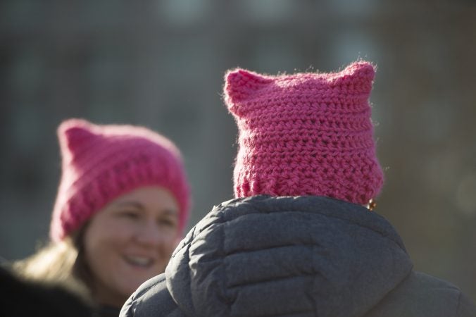 The ubiquitous Pussy Hats were worn by men and women alike. (Jonathan Wilson for WHYY)