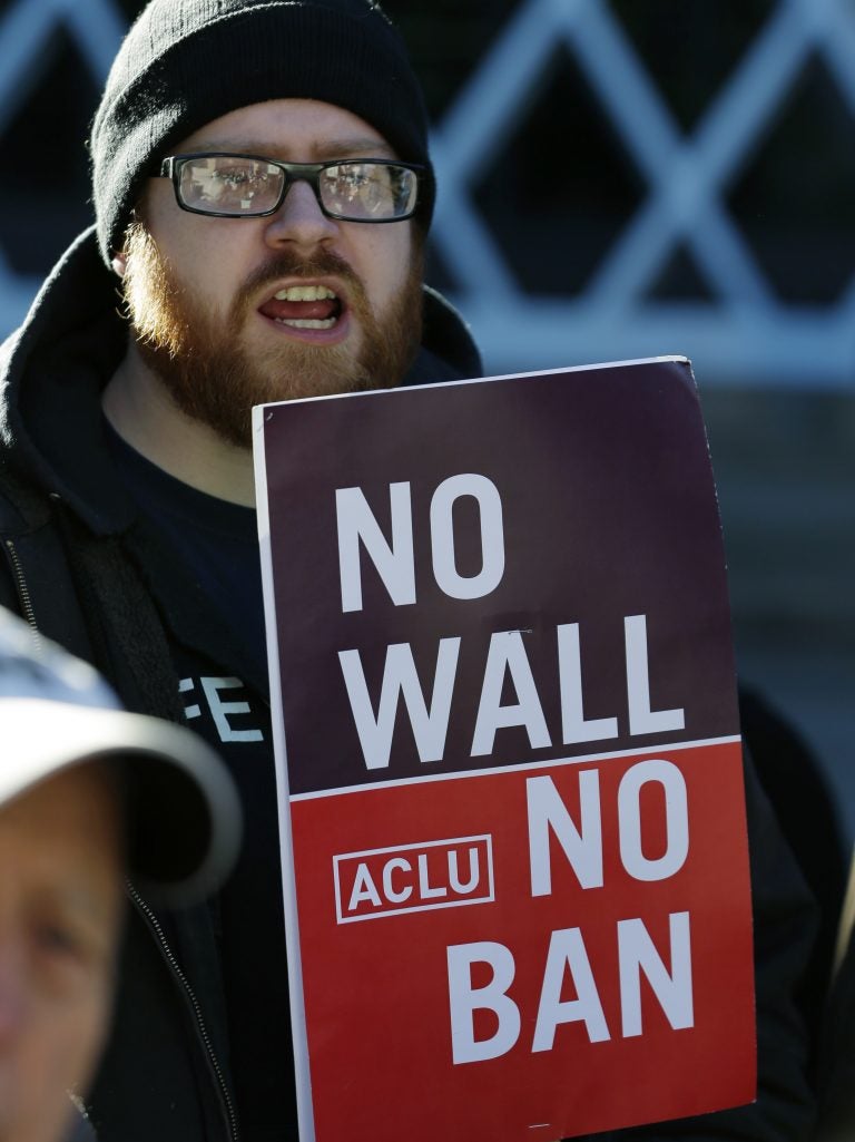 Protesters outside the courthouse where 9th Circuit Court of Appeals judges were hearing Hawaii's challenge last month to the Trump administration's latest travel ban. (Ted S. Warren/AP)
