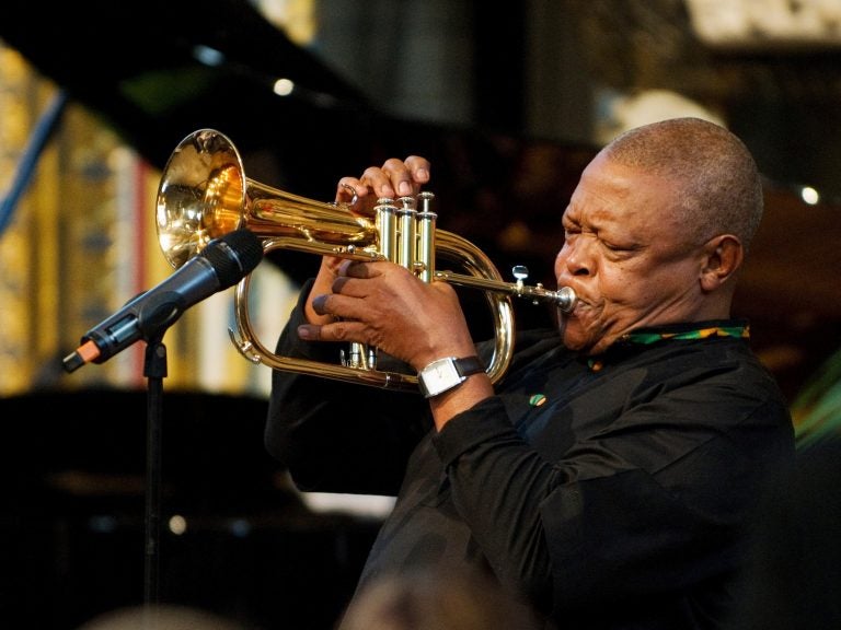 South African jazz musician Hugh Masekela performs during the Observance for Commonwealth Day service at Westminster Abbey in central London in March 2012.