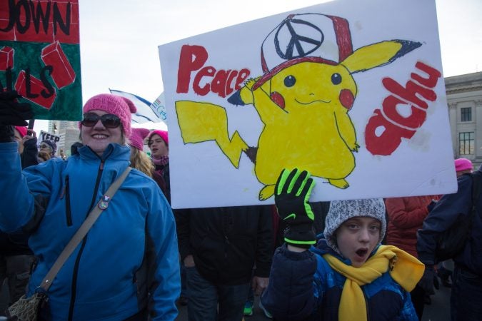 Marchers get creative with their signs at the 2018 Women's March on Philadelphia, January 20, 2018. (Emily Cohen for WHYY)