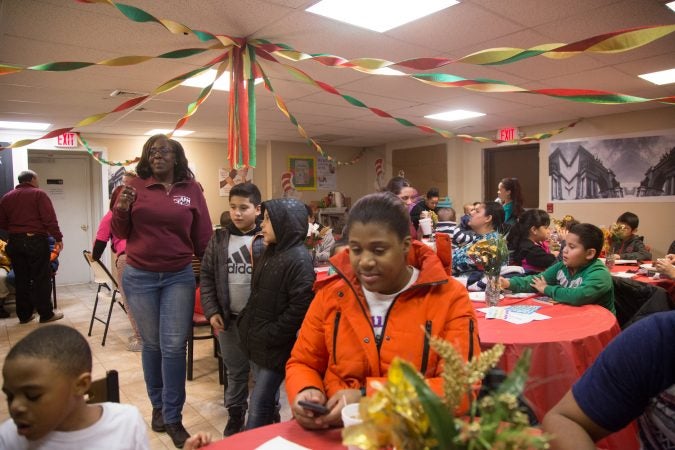 APM threw a Three Kings Day/Octavious celebration for diplaced families from Puerto Rico who have found their way to Philadelphia on January 12 2018. (Emily Cohen for WHYY)