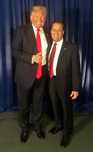 A photo of Ellis with candidate Donald Trump taken in April of 2016 is displayed in his office. 