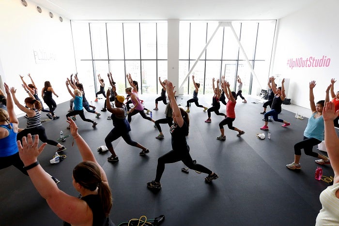 IMAGE DISTRIBUTED FOR SELF - Fitness enthusiasts are seen participating in a class at SELF Up & Out Studio on Saturday, June 27, 2015,  in New York. (Brian Ach/AP Images for Self)