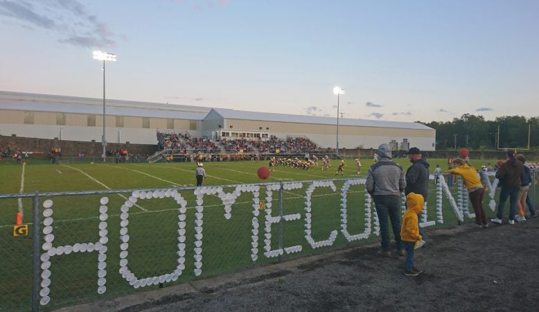 Titusville fans gather to watch the homecoming football game (Kevin McCorry/WHYY)