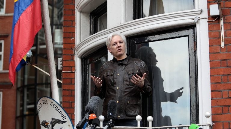 Julian Assange speaks to the media from the balcony of the Embassy of Ecuador on May 19, 2017, in London. (Jack Taylor/Getty Images) 