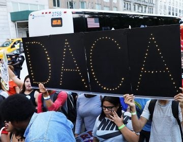 DACA advocates march near Trump Tower in August in New York City. The government says it will resume DACA renewals. (Spencer Platt/Getty Images) 
