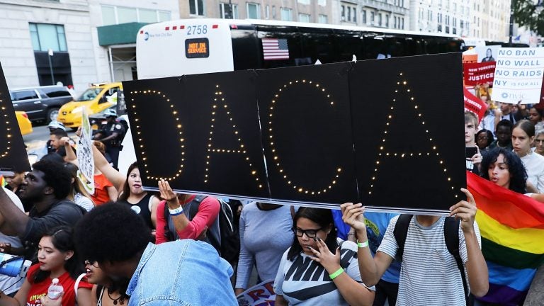 DACA advocates march near Trump Tower in August in New York City. The government says it will resume DACA renewals. (Spencer Platt/Getty Images) 