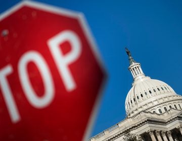 Capitol Hill is seen against a blue sky Saturday, the first day of the partial government shutdown (Brendan Smialowski/AFP/Getty Images)