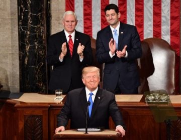 President Trump listens to applause before delivering his State of the Union address Tuesday night at the Capitol in Washington