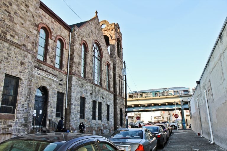 Prevention Point on the left, and a homeless shelter on the right, at the intersection of Kensington Ave. and Monmouth Street.