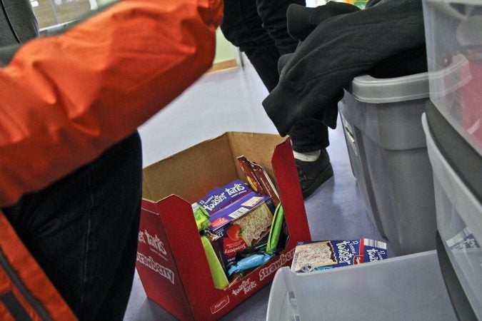 Nick Hale and Luke Dunn with Homeless Outreach always approach people and first offer them a snack.