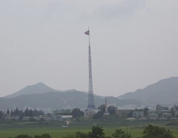 A giant North Korean flag flutters from a 528-foot pole near the border with South Korea. Tunnels built by North Korea's military are believed to extend across the border. (Ahn Young-joon/AP)