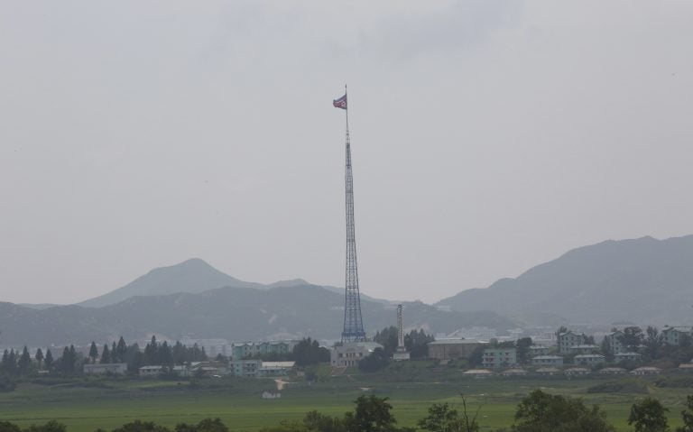 A giant North Korean flag flutters from a 528-foot pole near the border with South Korea. Tunnels built by North Korea's military are believed to extend across the border. (Ahn Young-joon/AP)