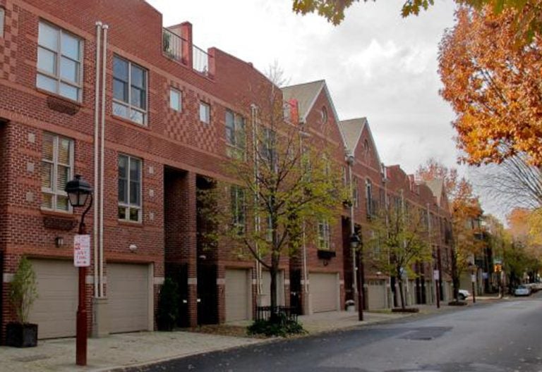 These garages on Lombard Street provide residential parking. (PlanPhilly)