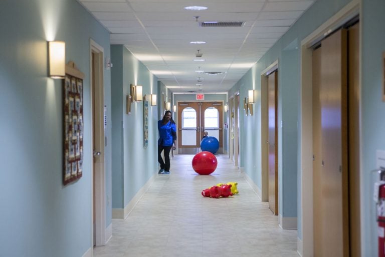 The main hallway of the SafeStart program, an early head start program on the campus of Allentown State Hospital in Allentown, Pa, is a play area for kids. (Jessica Kourkounis/for Keystone Crossroads)