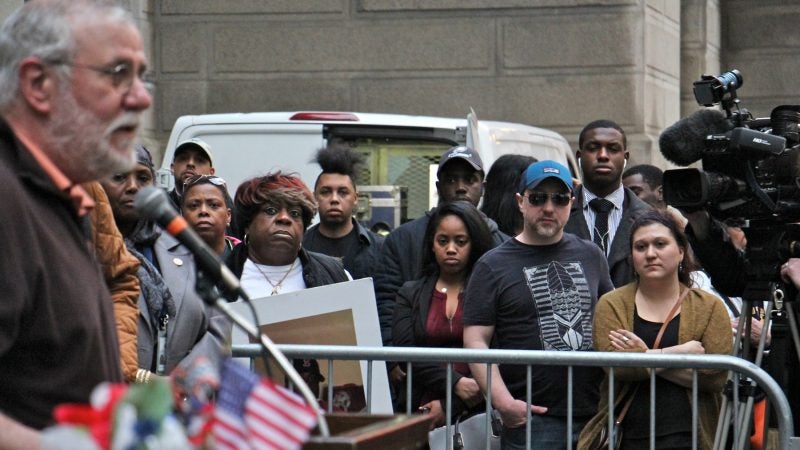 About 50 people gathered on the south apron of City Hall and listened to speakers describe how they had lost loved ones to violence. (Emma Lee/WHYY)