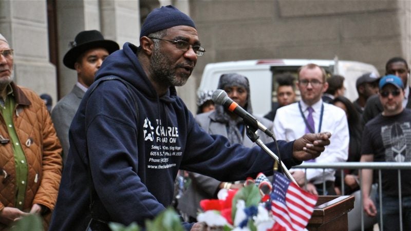 Yancey Harrell, whose youngest son, Charles, was shot to death six years ago, speaks during a vigil to remember the victims of gun violence. (Emma Lee/WHYY)