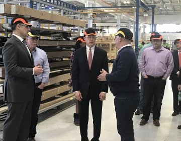 Sen. Pat Toomey (center) tours New Hudson Facades in Linwood, Pennsylvania, promoting the Tax Cuts and Jobs Act.