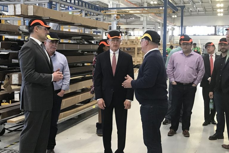 Sen. Pat Toomey (center) tours New Hudson Facades in Linwood, Pennsylvania, promoting the Tax Cuts and Jobs Act.