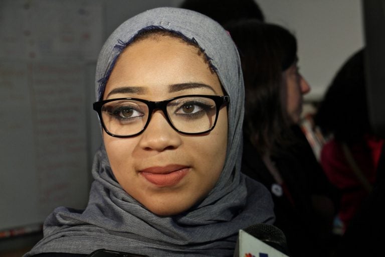 Nasihah Thompson-King talks with reporters after a press conference at Mastery Shoemaker Charter School. Her supporters called for an end to the requirement that hijab-wearing students obtain a waiver after Nasihah was prevented from playing because she refused to take off her head covering.