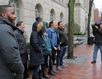 A dozen representatives of For Our Future political action committee chant outside Sen. Pat Toomey's Philadelphia office in support DACA (Deferred Action for Childhood Arrivals).