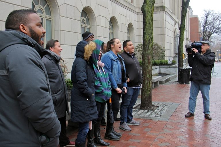 A dozen representatives of For Our Future political action committee chant outside Sen. Pat Toomey's Philadelphia office in support DACA (Deferred Action for Childhood Arrivals).