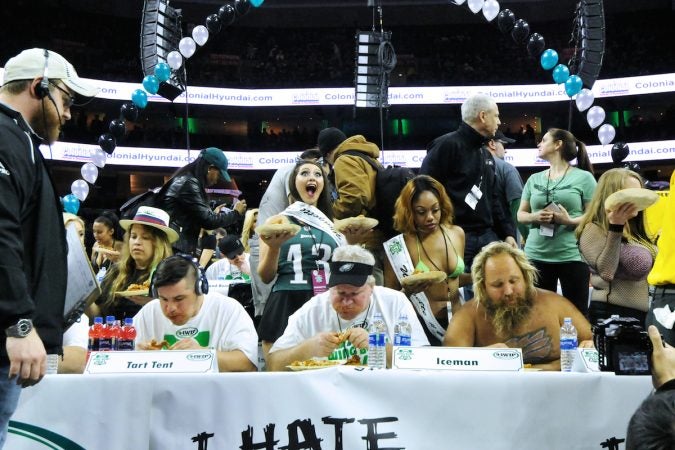 Two days ahead of Super Bowl LII, competitive eaters consume large amounts of wings during the annual Wing Bowl competition at the Wells Fargo Center. (Bastiaan Slabbers for WHYY)