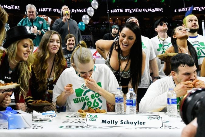 Molly Schuyler competing for the win during Wing Bowl 26, at the Wells Fargo Center, on Friday. (Bastiaan Slabbers for WHYY)