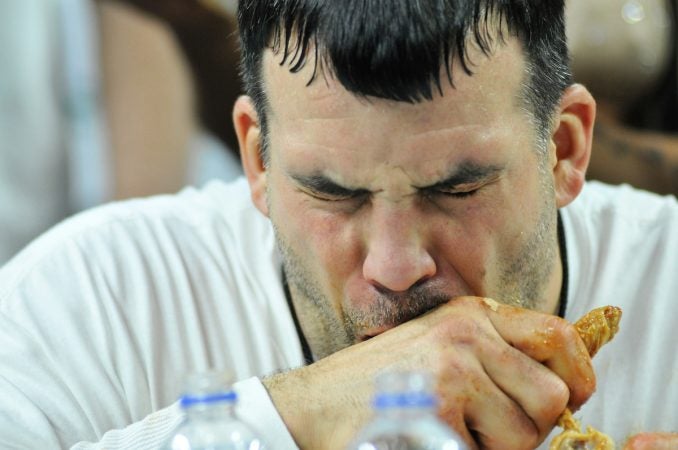 Two days ahead of Super Bowl LII, competitive eaters consume large amounts of wings during the annual Wing Bowl competition, at the Wells Fargo Center, on Friday. (Bastiaan Slabbers for WHYY)