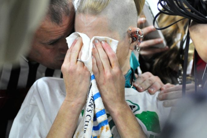 Molly Schuyler wins the event by consuming the record-breaking amount of 501 wings, during Wing Bowl 26, at the Wells Fargo Center, on Friday. (Bastiaan Slabbers for WHYY)