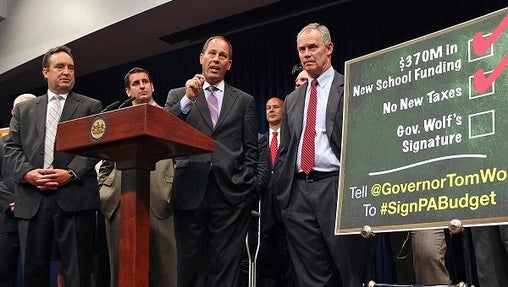 Senate Majority Leader Jake Corman, Senate President Pro Tempore Joe Scarnati, and House Speaker Mike Turzai stand with other GOP leaders. They're currently appealing to two federal courts in an attempt to get the state Supreme Court's congressional map overturned. (Chris Knight/AP Photo, File)