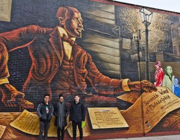 (From left) Penn students Ramon Garcia-Gomez, Helen Fetaw, and Nathaniel Gertzman, tour the 7th Ward. They read about W. E. B. Du Bois and his research in Philadelphia as part of their African American History class. (Kimberly Paynter/WHYY)