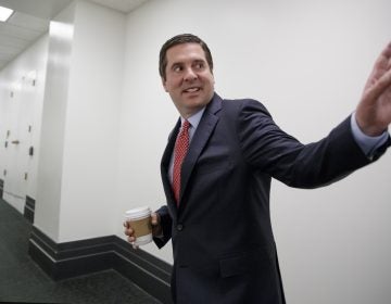 House Intelligence Committee Chairman Rep. Devin Nunes, R-Calif., waves as he arrives for a closed-door GOP strategy session on Capitol Hill in Washington, Tuesday, April 4, 2017.