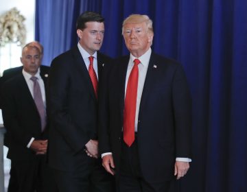 Rob Porter, White House Staff Secretary, left, speaks to President Donald Trump