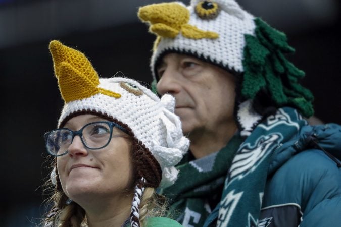 Philadelphia Eagles fans wait before the NFL Super Bowl 52 football game between the Eagles and the New England Patriots Sunday, Feb. 4, 2018, in Minneapolis.