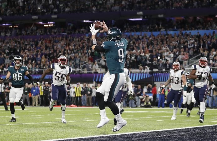 Philadelphia Eagles' Nick Foles catches a touchdown pass during the first half of the NFL Super Bowl 52 football game against the New England Patriots Sunday, Feb. 4, 2018, in Minneapolis. (AP Photo/Jeff Roberson)