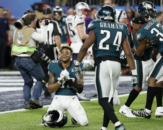 Philadelphia Eagles' Rodney McLeod, bottom, celebrates after the NFL Super Bowl 52 football game against the New England Patriots Sunday, Feb. 4, 2018, in Minneapolis. The Eagles won 41-33. (AP Photo/Matt York)