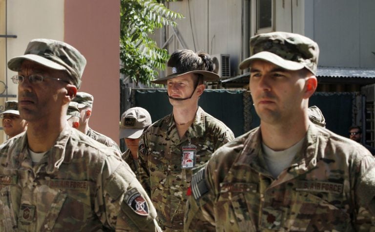 US soldiers stand attention during a ceremony marking Memorial Day at the Resolute Support main headquarters in Kabul, Afghanistan, Monday, May 25, 2015. (Allauddin Khan/AP Photo)