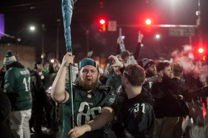 Fans in Northeast Philadelphia flooded Frankford and Cottman Avenue after the Eagles 41-33 win over the New England Patriots to become the 2018 Super Bowl Champions Sunday night. (Brad Larrison for WHYY)