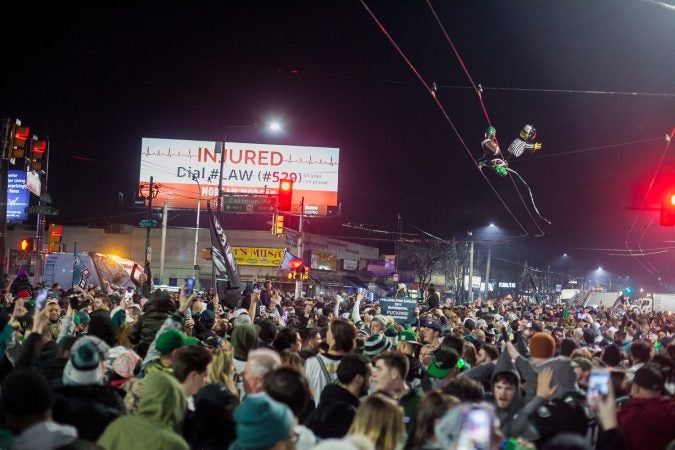 Fans in Northeast Philadelphia flooded Frankford and Cottman Avenue after the Eagles 41-33 win over the New England Patriots to become the 2018 Super Bowl Champions Sunday night. (Brad Larrison for WHYY)