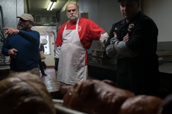 Employees of Esposito’s Porchetta hang out before the Super Bowl on January 4, 2018. (Branden Eastwood for WHYY)