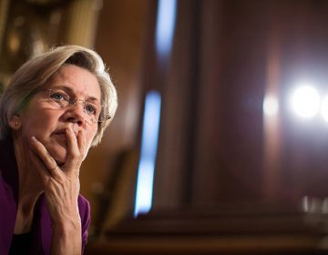 Massachusetts Sen. Elizabeth Warren, above, and Virginia Sen. Mark Warner are introducing legislation that would levy harsh penalties for security breaches at credit-rating agencies. (Drew Angerer/Getty Images)